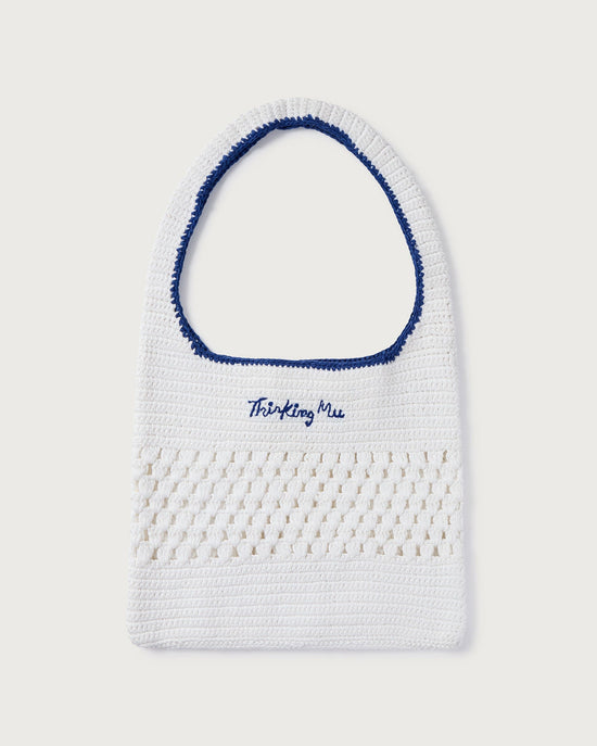 White handbag handwoven with crochet