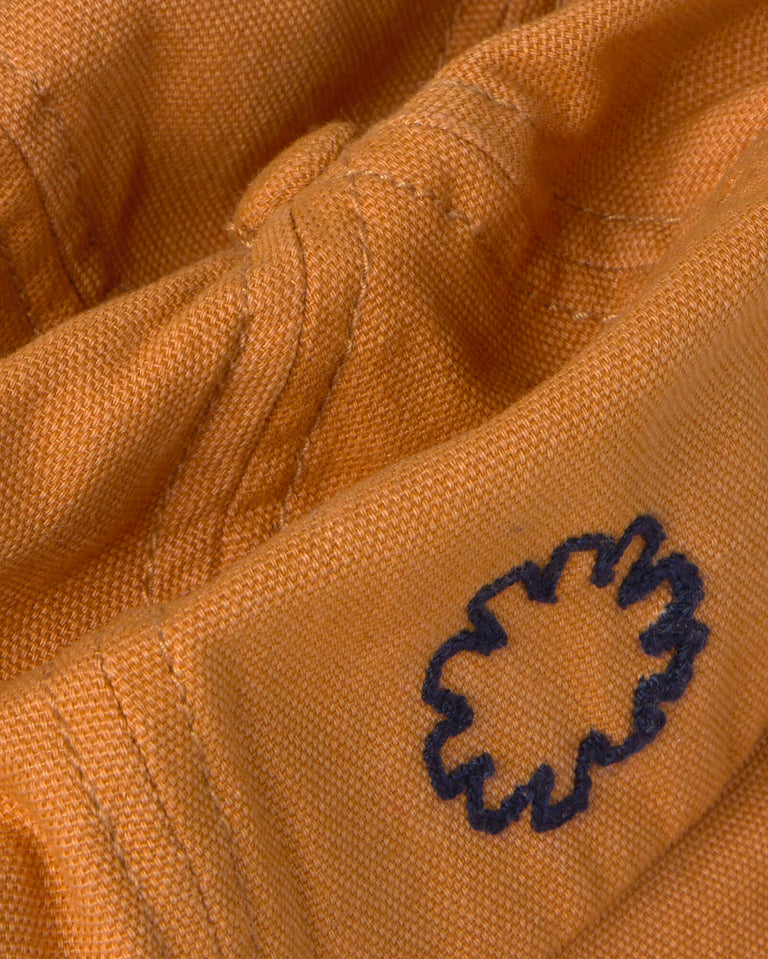 Gorro bucket naranja Norfeu sostenible silueta - 3